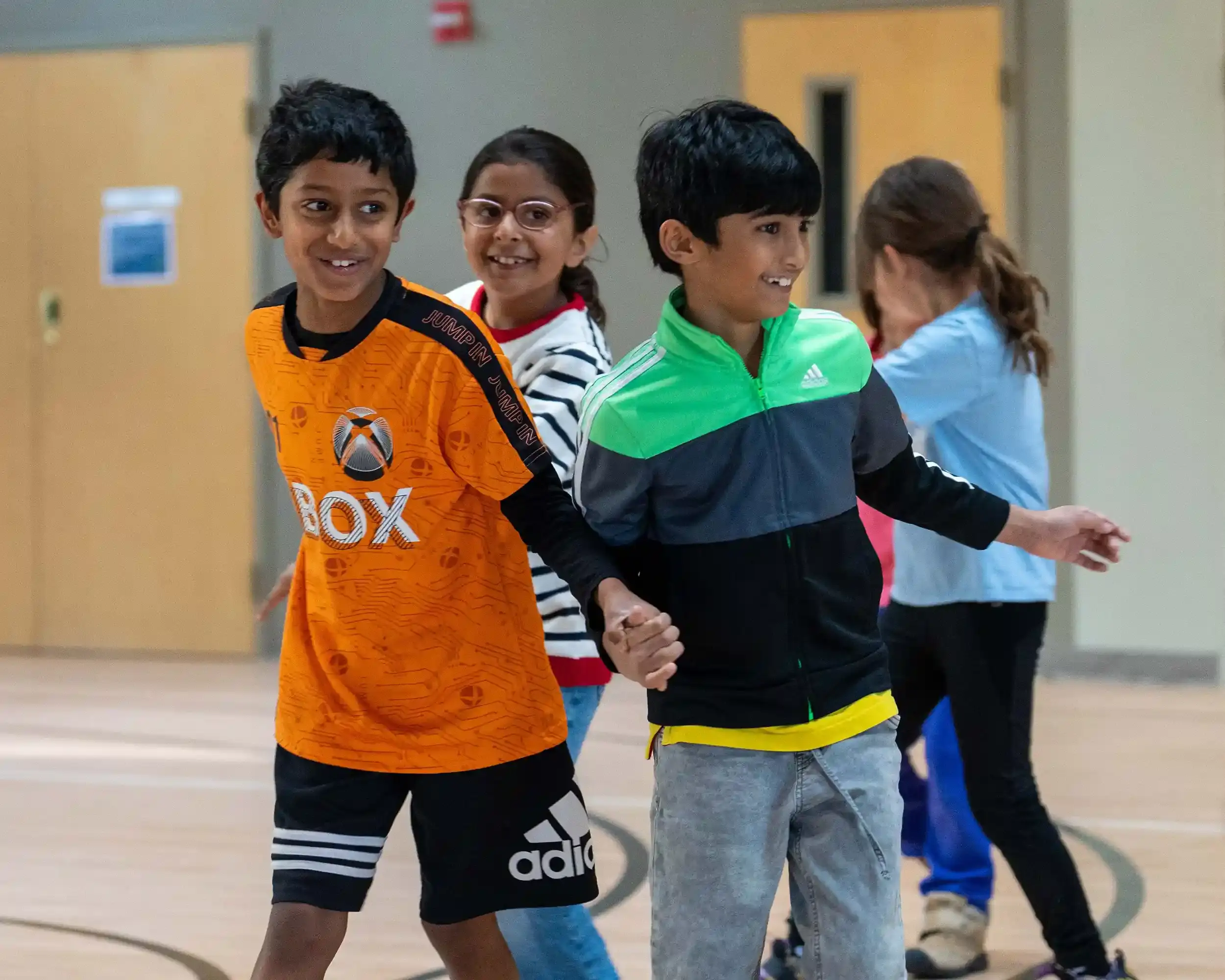 Kids playing on a school field